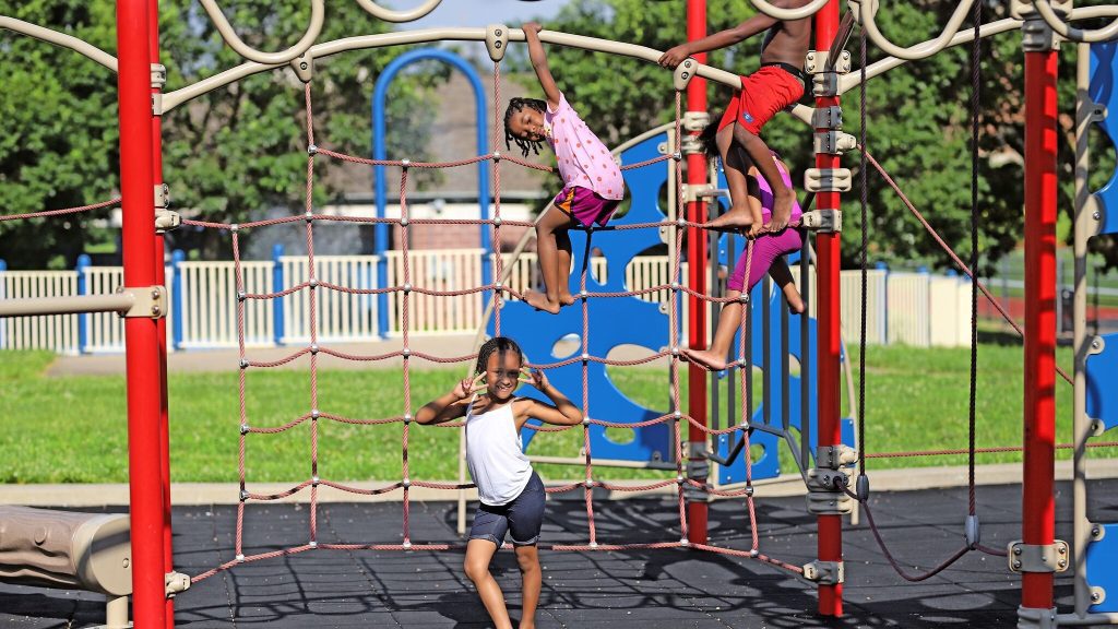 Kids climbing ropes at the park
