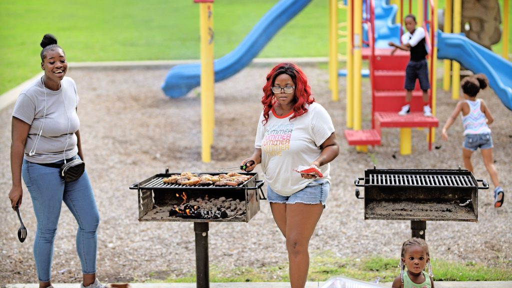 Individuals grilling at Hibbs Park