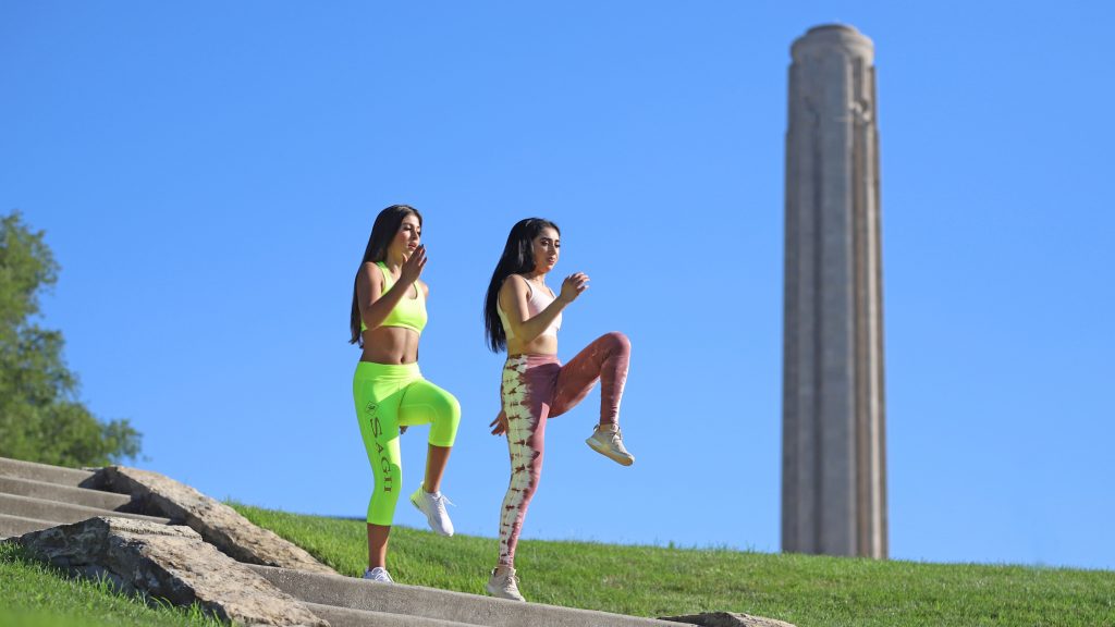 Girls exercising on memorial hill