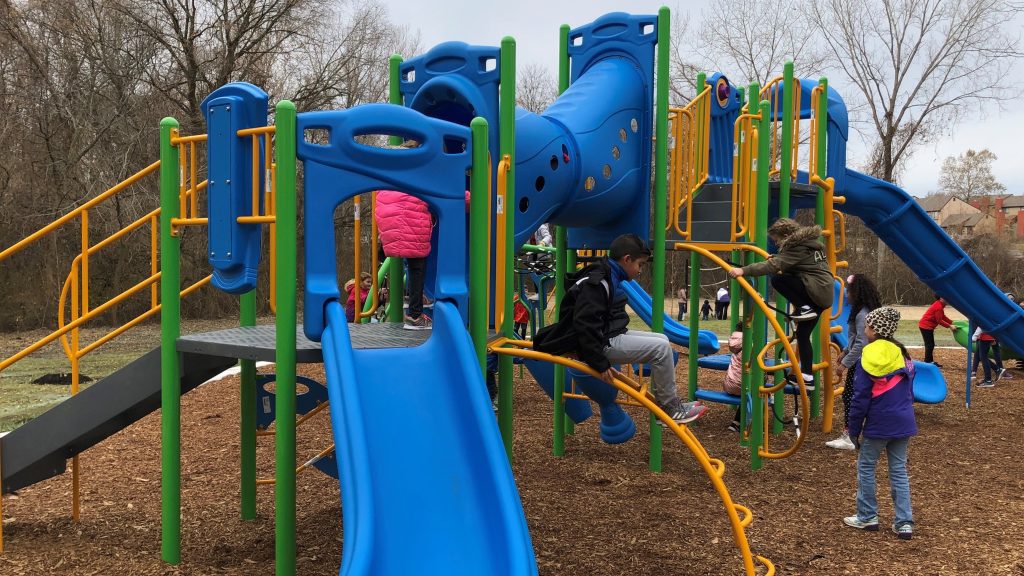 Kids on Slides and Swings